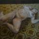 Pregnant Woman on Linoleum Floor