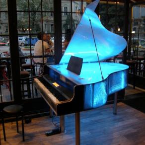 Translucent lighted stage piano 