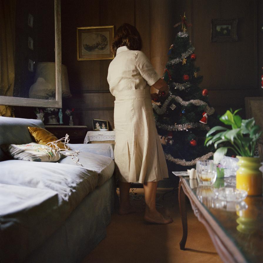 Mom decorating the tree