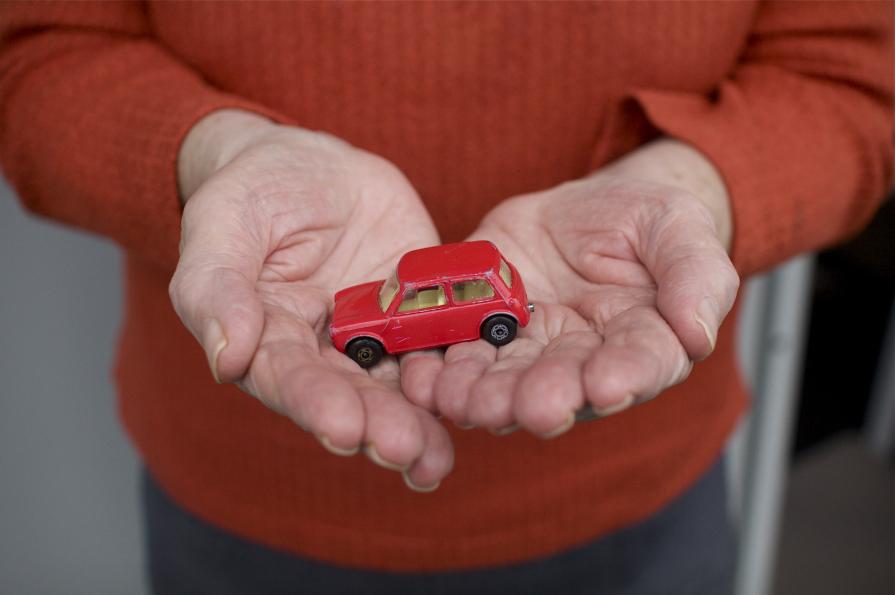 Hands of my mother with my first car.