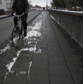 man on bike, iceland 