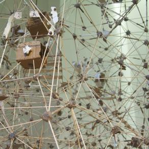 An uncertain map of the known universe made of wax, wood, clay, ropes and various paper