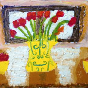 Yellow vase with flowers and apples